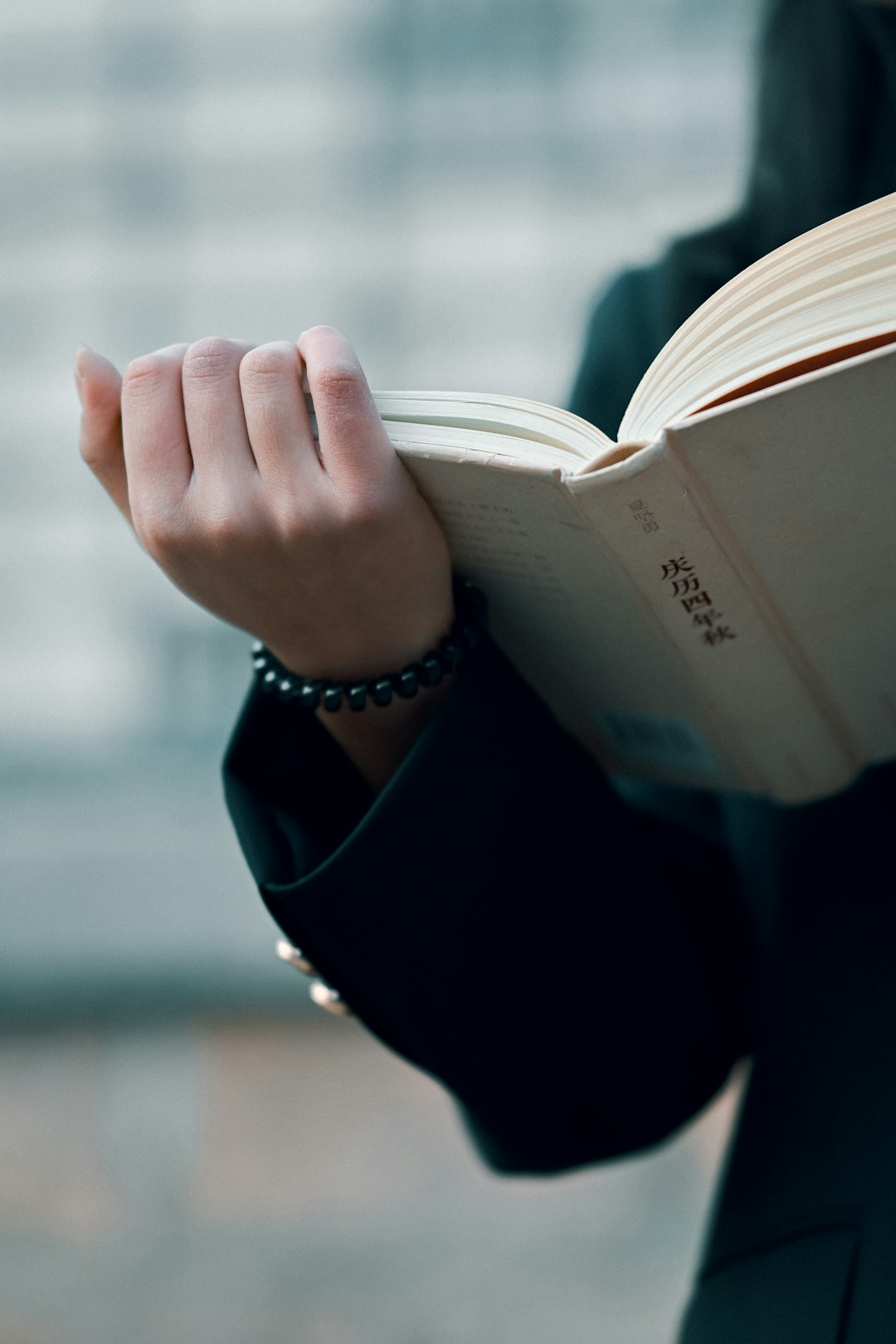 Person reading about trademark protection before applying