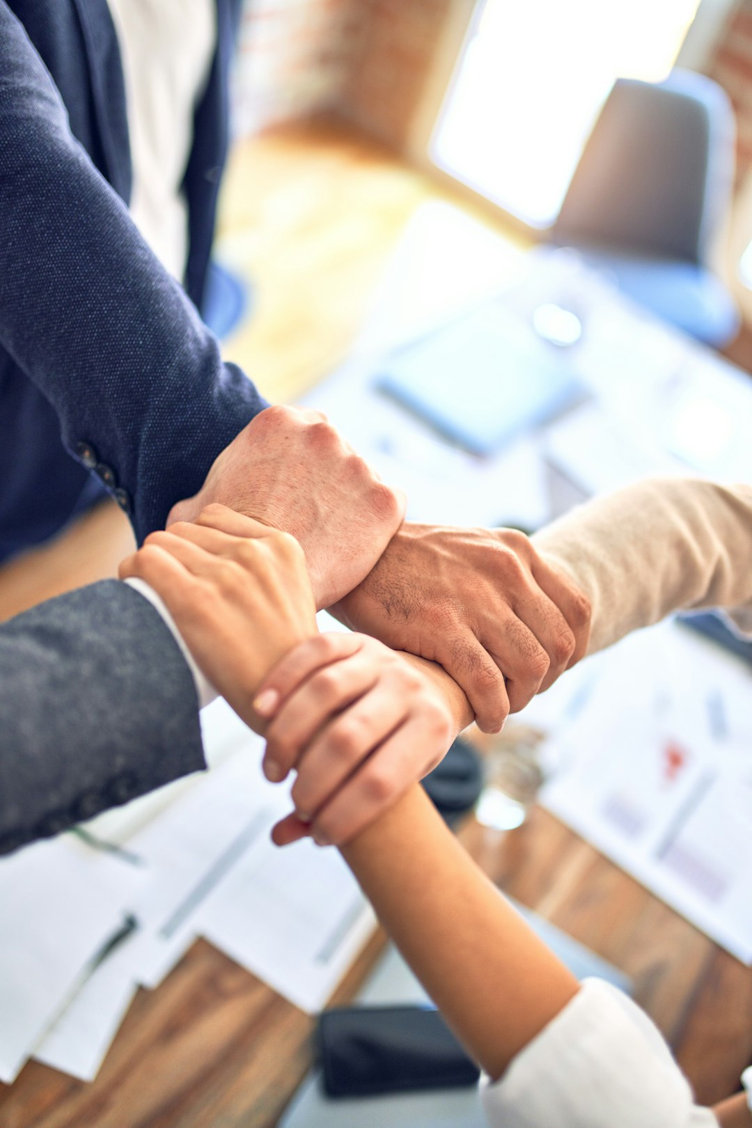 Business team working together to manage a trademark portfolio
